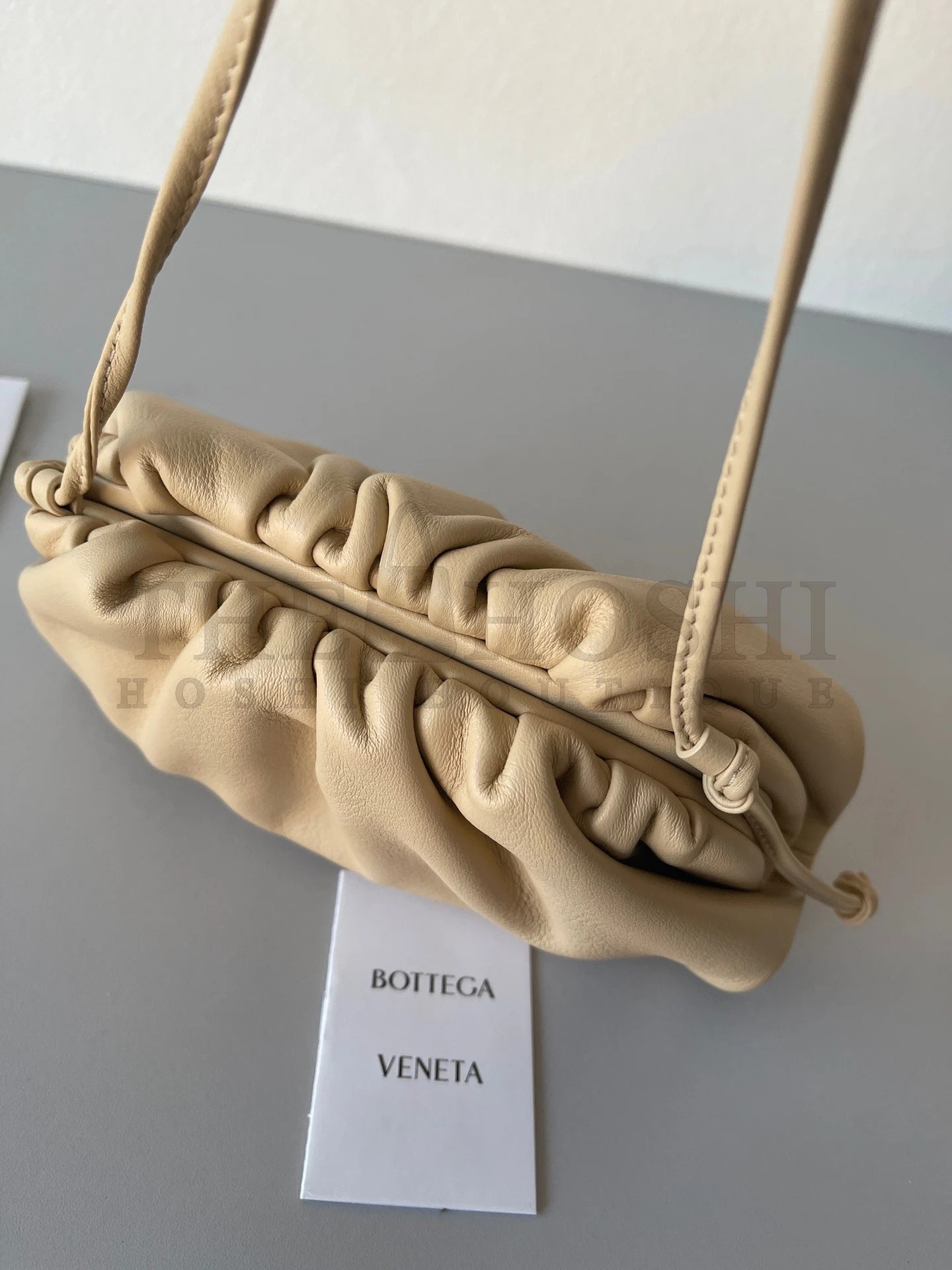 B0tt*ga Ven*ta Mini Pouch with Strap in Almond Calfskin Master Quality