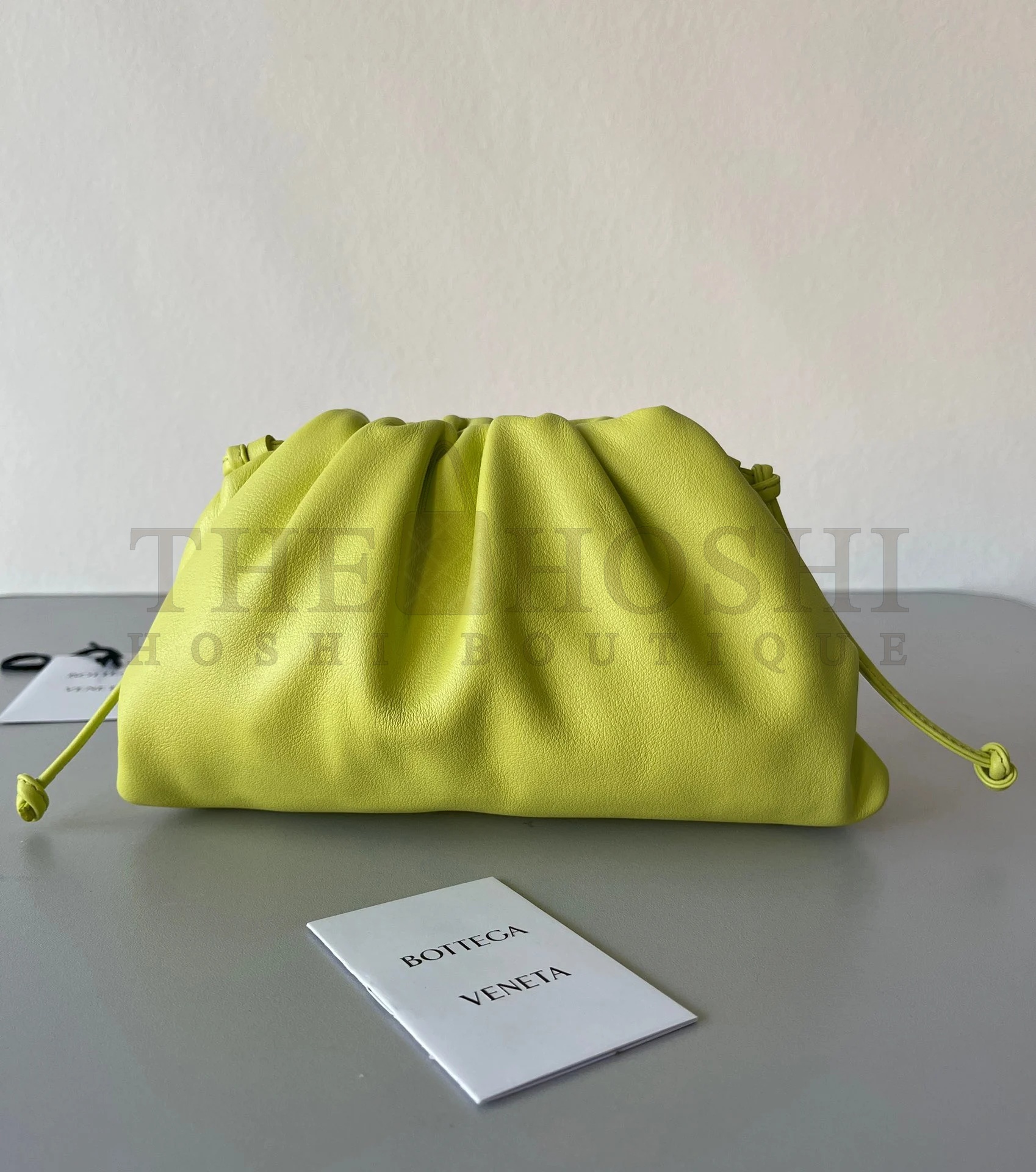 B0tt*ga Ven*ta Mini Pouch with Strap in Kiwi Calfskin Master Quality